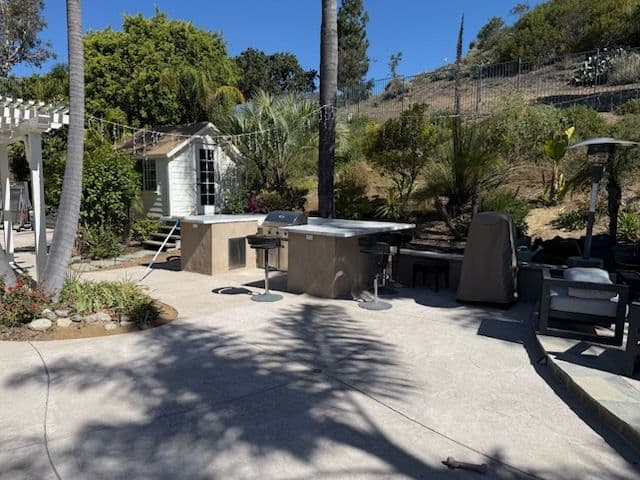 Pool Remodel, Fresh Concrete and an Outdoor BBQ Built for Real Living