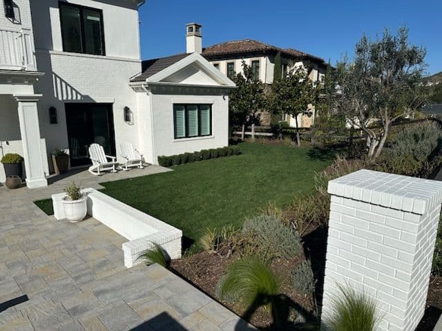 Gallery photos for Elegant Landscape Design for Modern White Brick Home: Image #1